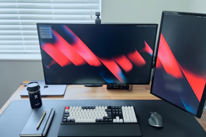 Wide angle view of Shane's complete desk setup with dual monitor configuration