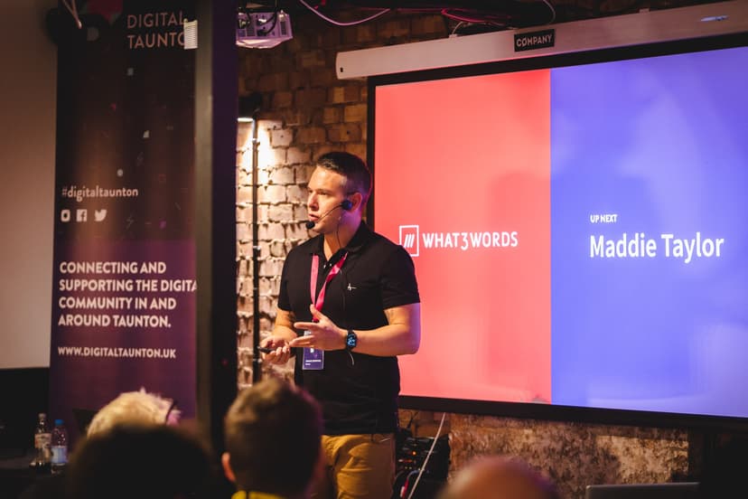 Shane delivering a keynote presentation with professional setup